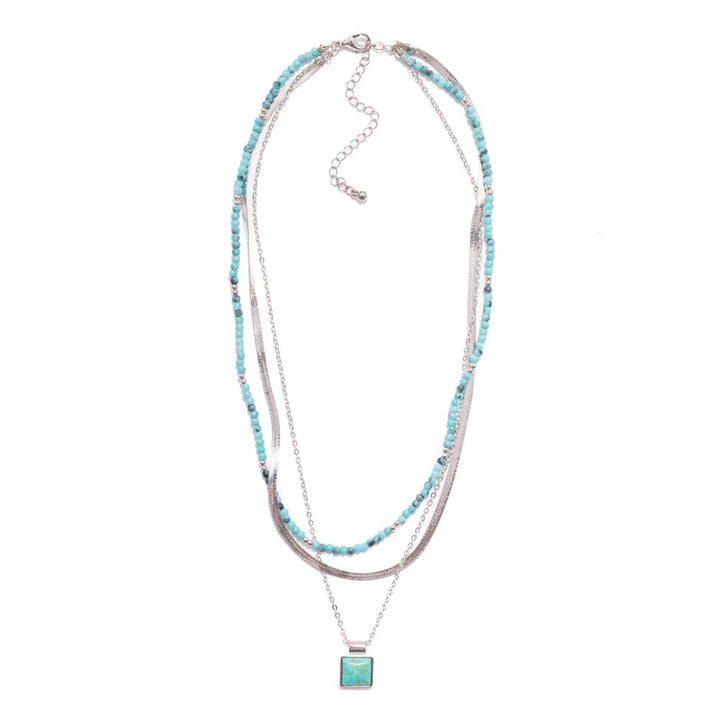 Layered Chain Link Necklace Featuring Metal Tones, Stone Beads, & Square Stone Pendant