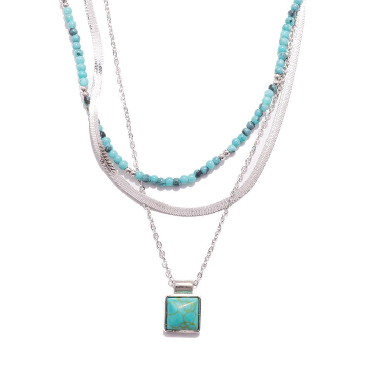 Layered Chain Link Necklace Featuring Metal Tones, Stone Beads, & Square Stone Pendant
