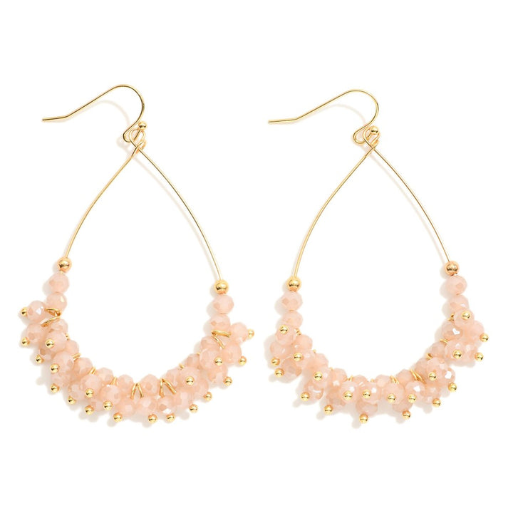 Metal Tone Wire Teardrop Earrings Featuring Faceted Bead Details