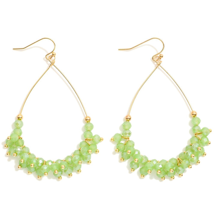 Metal Tone Wire Teardrop Earrings Featuring Faceted Bead Details