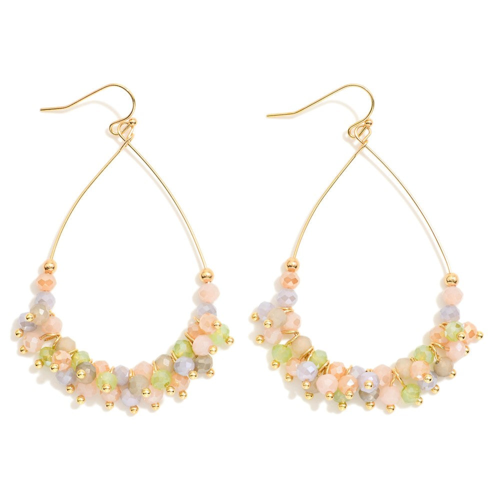 Metal Tone Wire Teardrop Earrings Featuring Faceted Bead Details