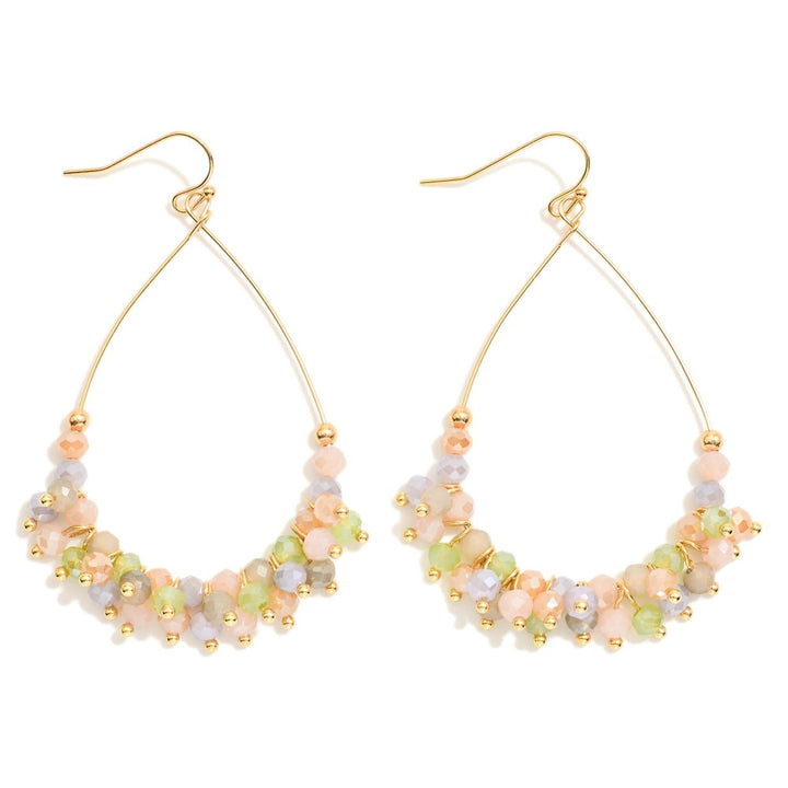 Metal Tone Wire Teardrop Earrings Featuring Faceted Bead Details