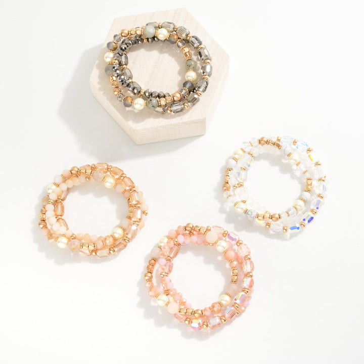 Set Of Three Beaded Stretch Bracelets Featuring Metal Tones, Pearls, & Iridescent Beads