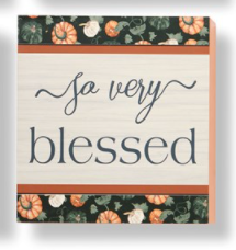 The perfect way to decorate a book shelf, entryway console or wall is with this ready-to-hang seasonal sign detailed with a pumpkin border and an inspirational sentiment: SO VERY BLESSED