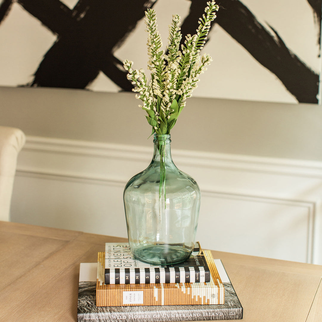 clear carafe bottle vase with florals