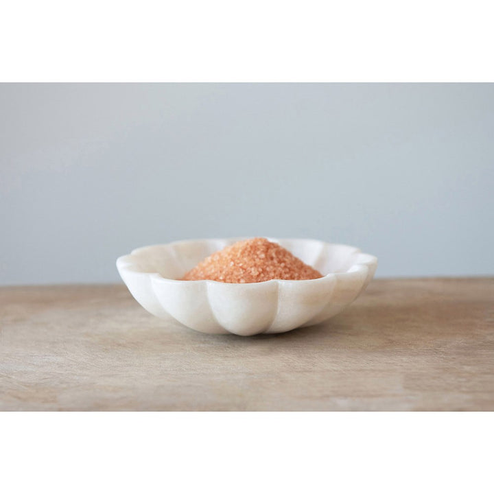 white carved marble flower shaped dish
